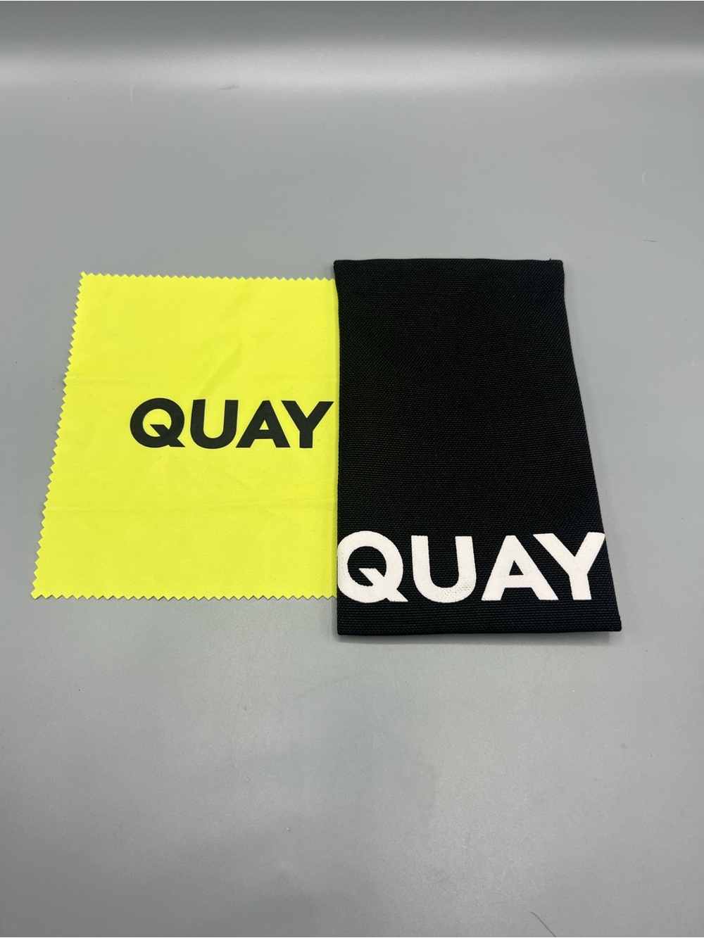 Quay Australia Black Sunglasses Squeeze Pouch with Neon Yellow Cloth
